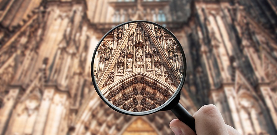 A magnifying glass over a church
