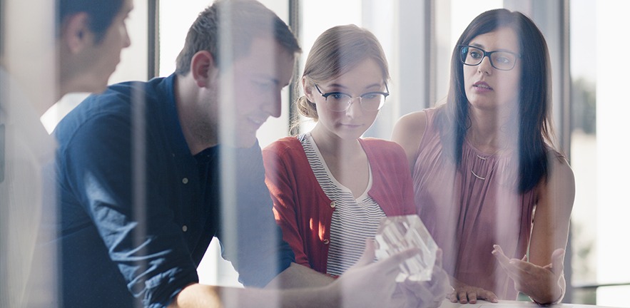 Group of people in discussion in the workplace