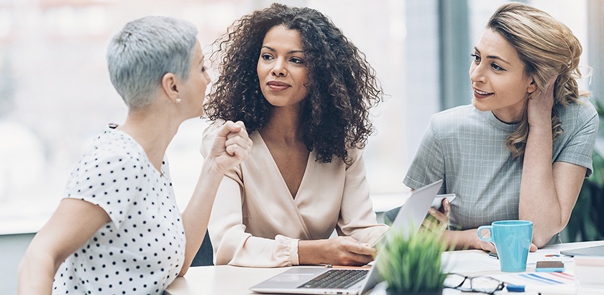 Group of businesswomen talking in the office