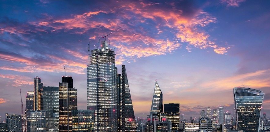 Photo of the City of London at sunset.