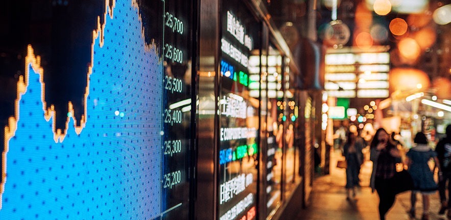 Photo of stock market on street.