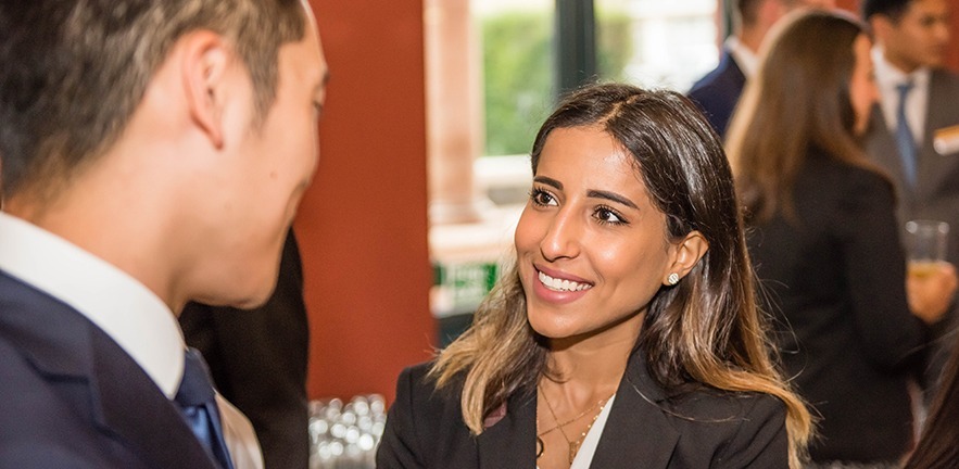 Cambridge MBA candidates in discussion.