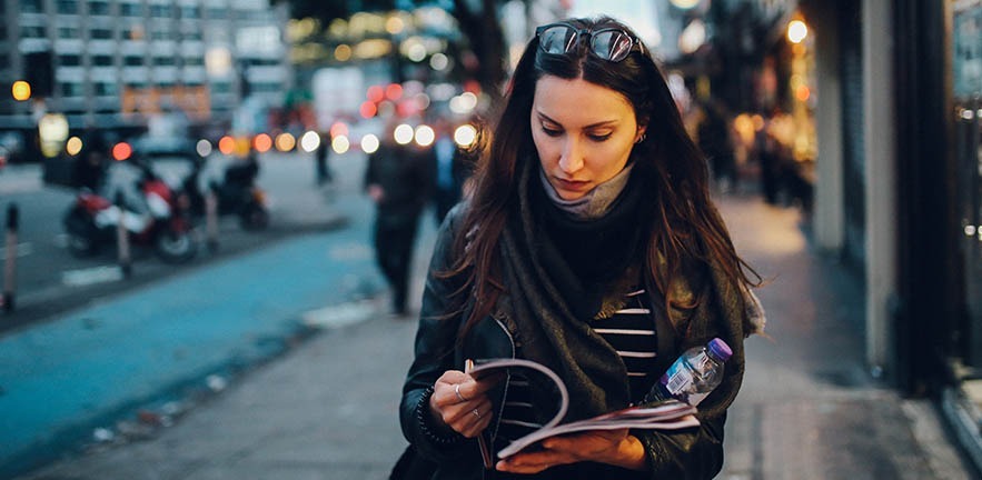 Young woman walking on the streets of central London.