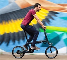 Dave Henderson, FLIT Technical lead, riding a FLIT bike.