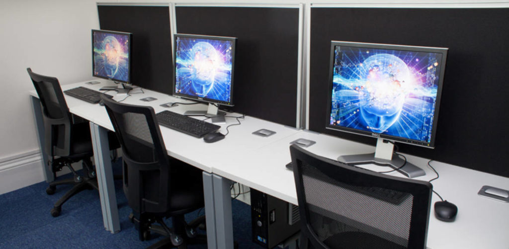 A row of three PCs in the Experimental Lab.