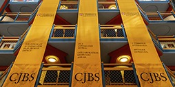 CJBS banners hanging from the walkways.