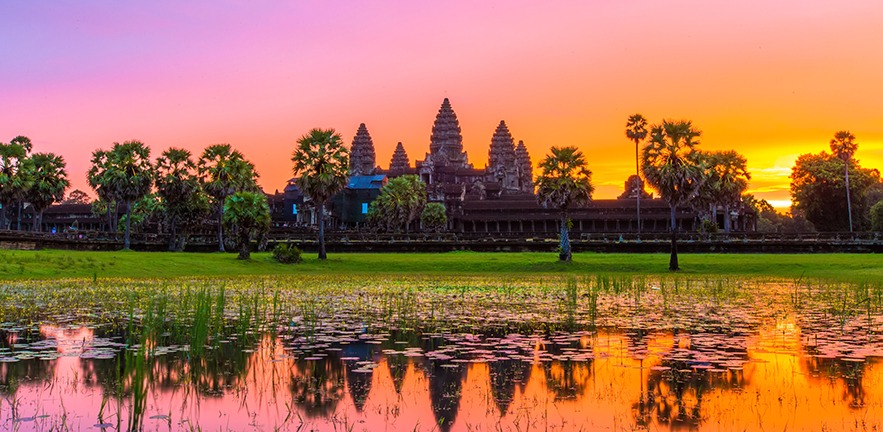 Pink-orange sunset over Cambodia.