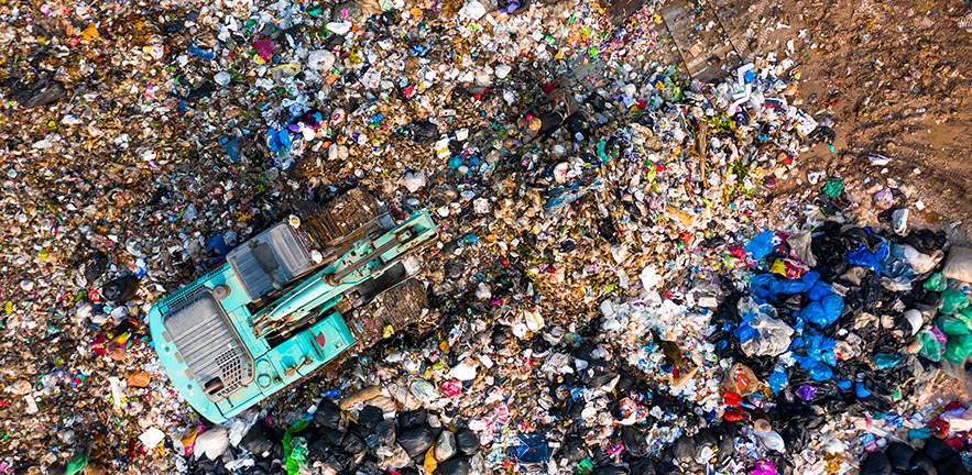 Ecosystem and healthy environment concepts and background, Garbage pile in trash dump or landfill, Aerial view garbage trucks unload garbage to a landfill, global warming.