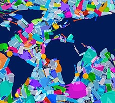 A world map made up of waste items.