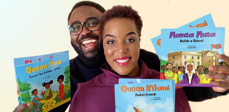 Oladele Olafuyi, (MBA 2017) and his wife Louisa holding some of their story books.