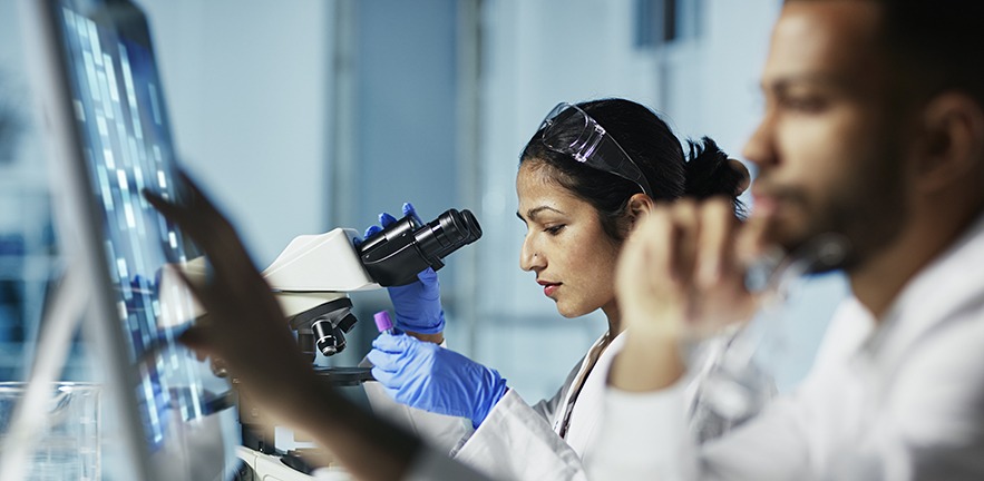 Scientists working in a modern laboratory.