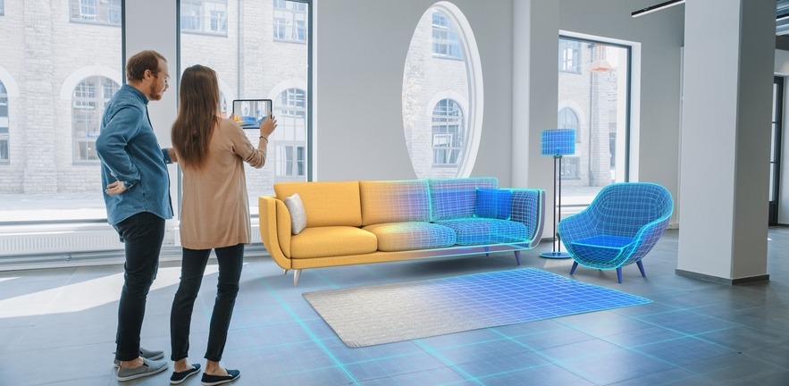A couple use an augmented reality tool to help decide how to decorate their apartment.