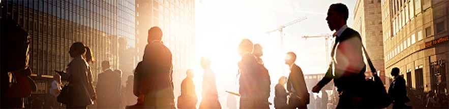 City workers walking to work at sunrise.