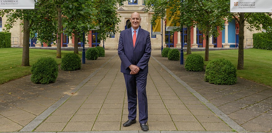 Professor Mauro F Guillén, Dean of Cambridge Judge Business School, outside CJBS.