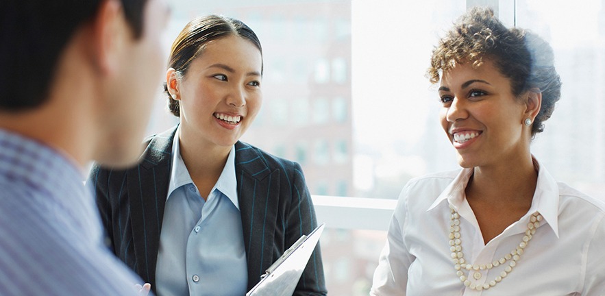 Business people talking in an office.