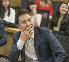 Male Asian MBA student in a lecture.