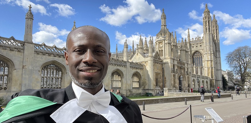 Ayobami Akinyode Olunloyo in front of King's College, Cambridge.