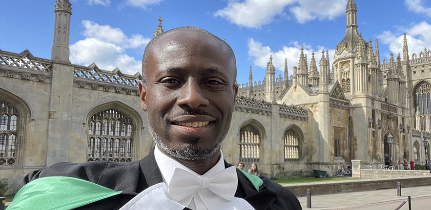 Ayobami Akinyode Olunloyo in front of King's College, Cambridge.