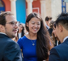 Group of MBA students outside.