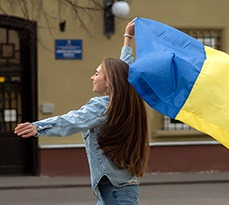 Waving the flag of Ukraine.