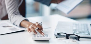 Woman using a calculator.