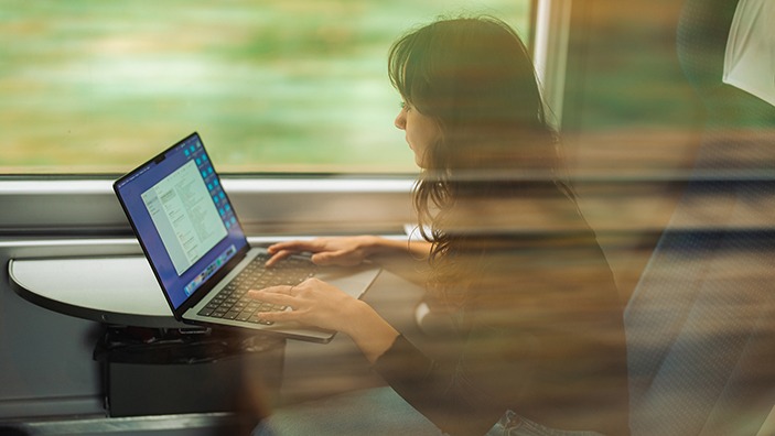 Woman looking at a computer screen.