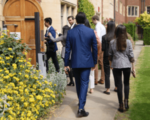 Students walking into a Cambridge College.