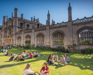 Students on the lawns in front of Kings College, Cambridge.