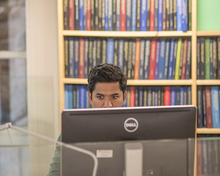 Student studying in the library.