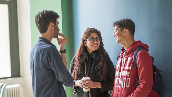 Cambridge students chatting.