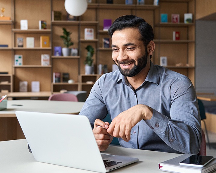 Someone attending a webinar.