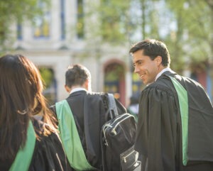 MBA students wearing graduation gowns.