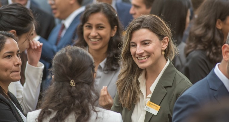 Women smiling.