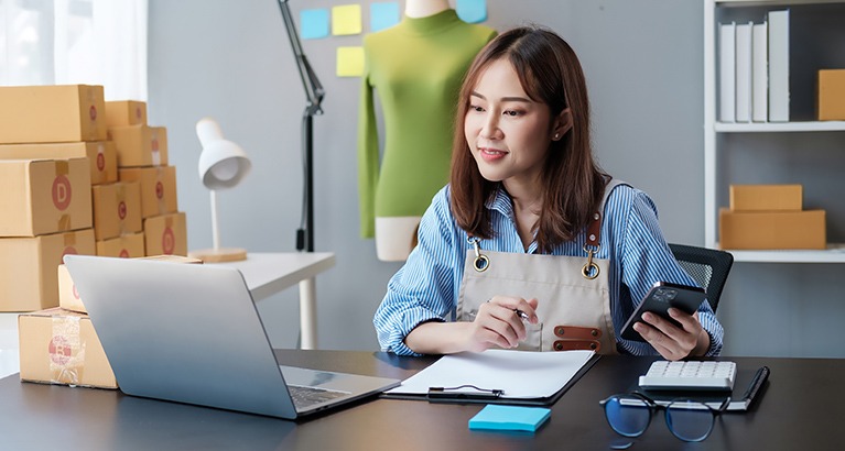 Woman working in a small company.