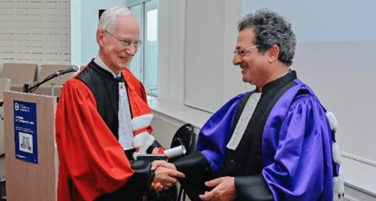 David Newbery receiving his honorary doctorate.