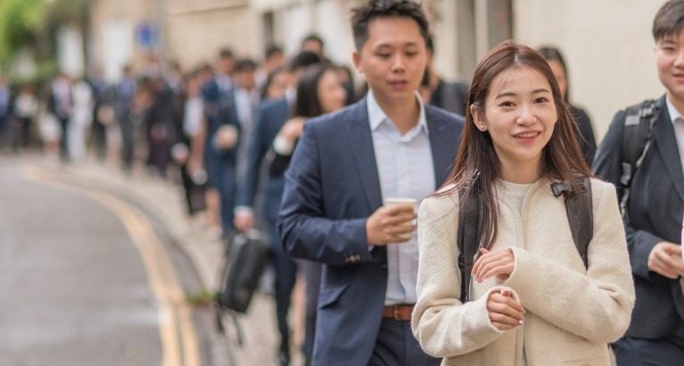 MBA students smiling.