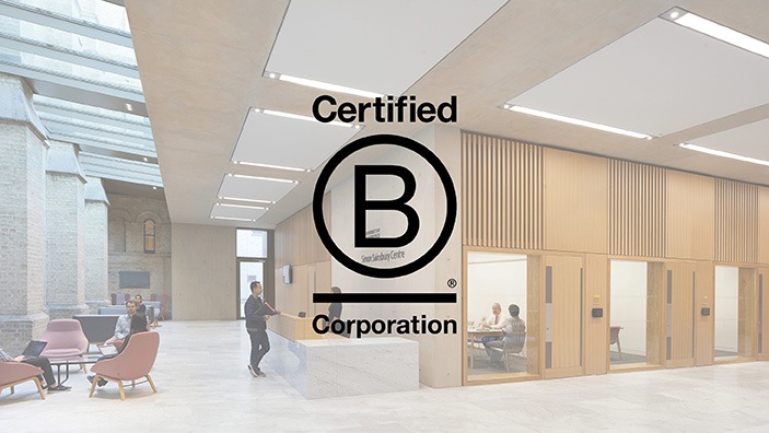 Image of reception area of Simon Sainsbury Centre at Cambridge Judge, with B Corp logo overlaid.