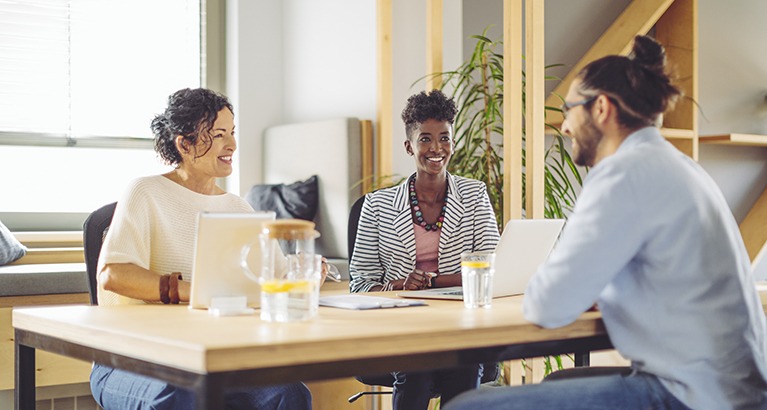 Group of people working at a startup.