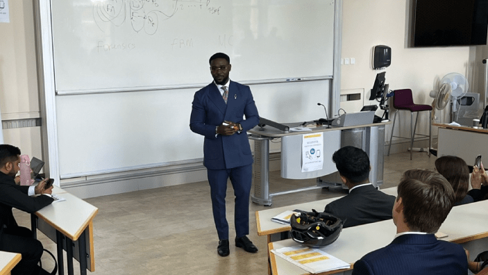 Ose presenting to class.