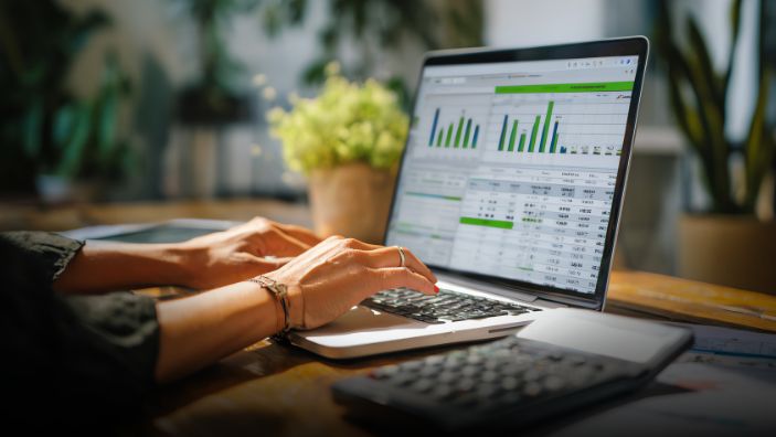 Barclays case study, woman working at laptop