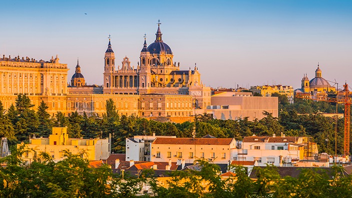Madrid Almundena Cathedral and Palacio Real sunset cityscape panorama Spain.