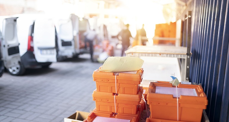 Medical transport boxes at a delivery warehouse.
