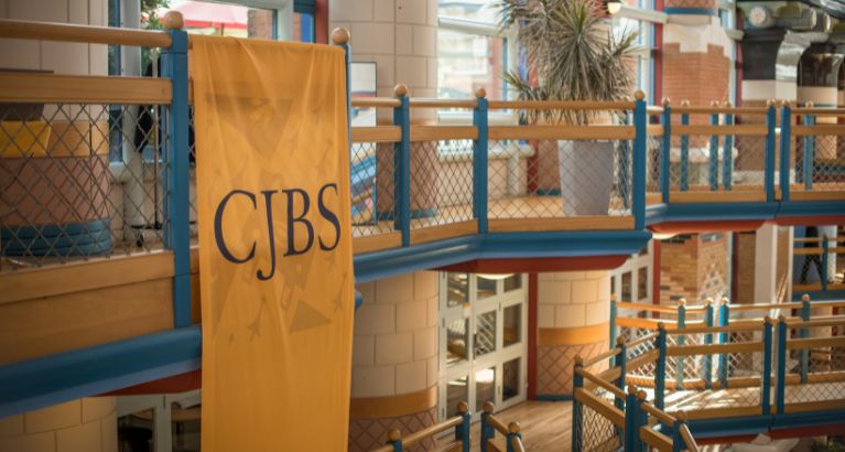 A banner that reads CJBS.