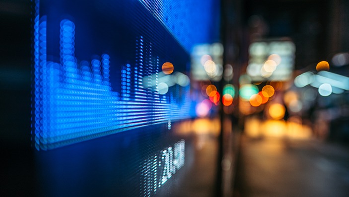 Financial stock exchange market display screen board on the street.